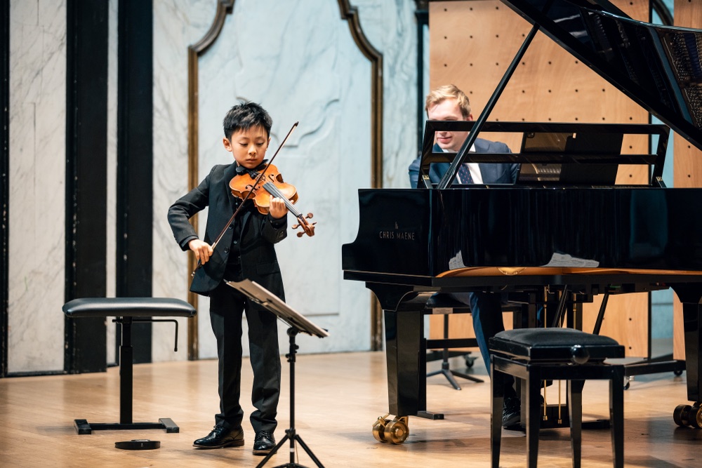 Student performing a violin and piano duo